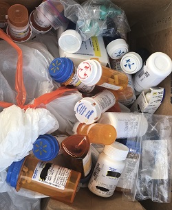One of the many boxes of unwanted medications collected at Operation Medicine Cabinet